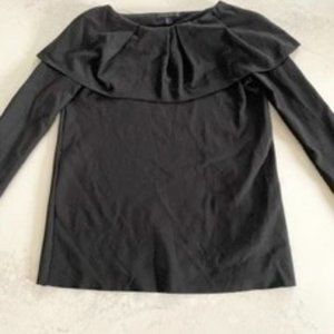 Cos size small black top with ruffle around the neck